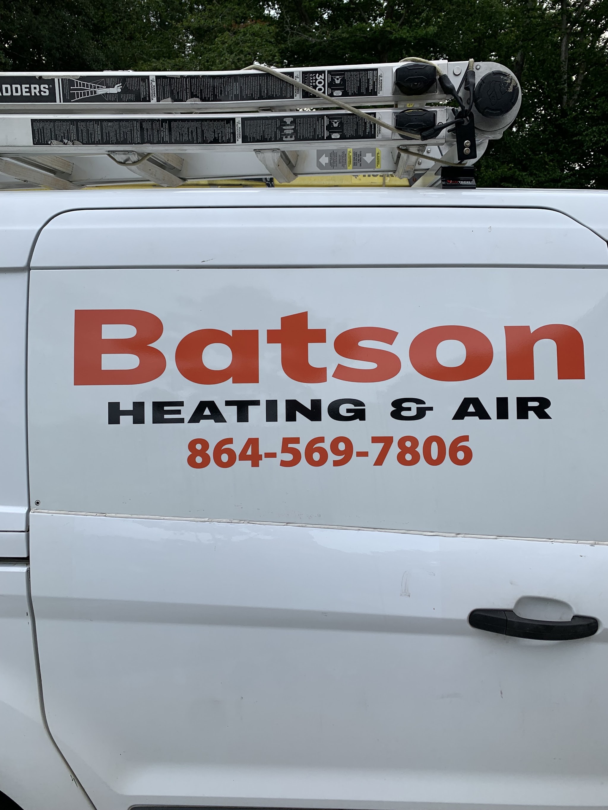 Our work van with Batson Heating & Air lettering and phone number