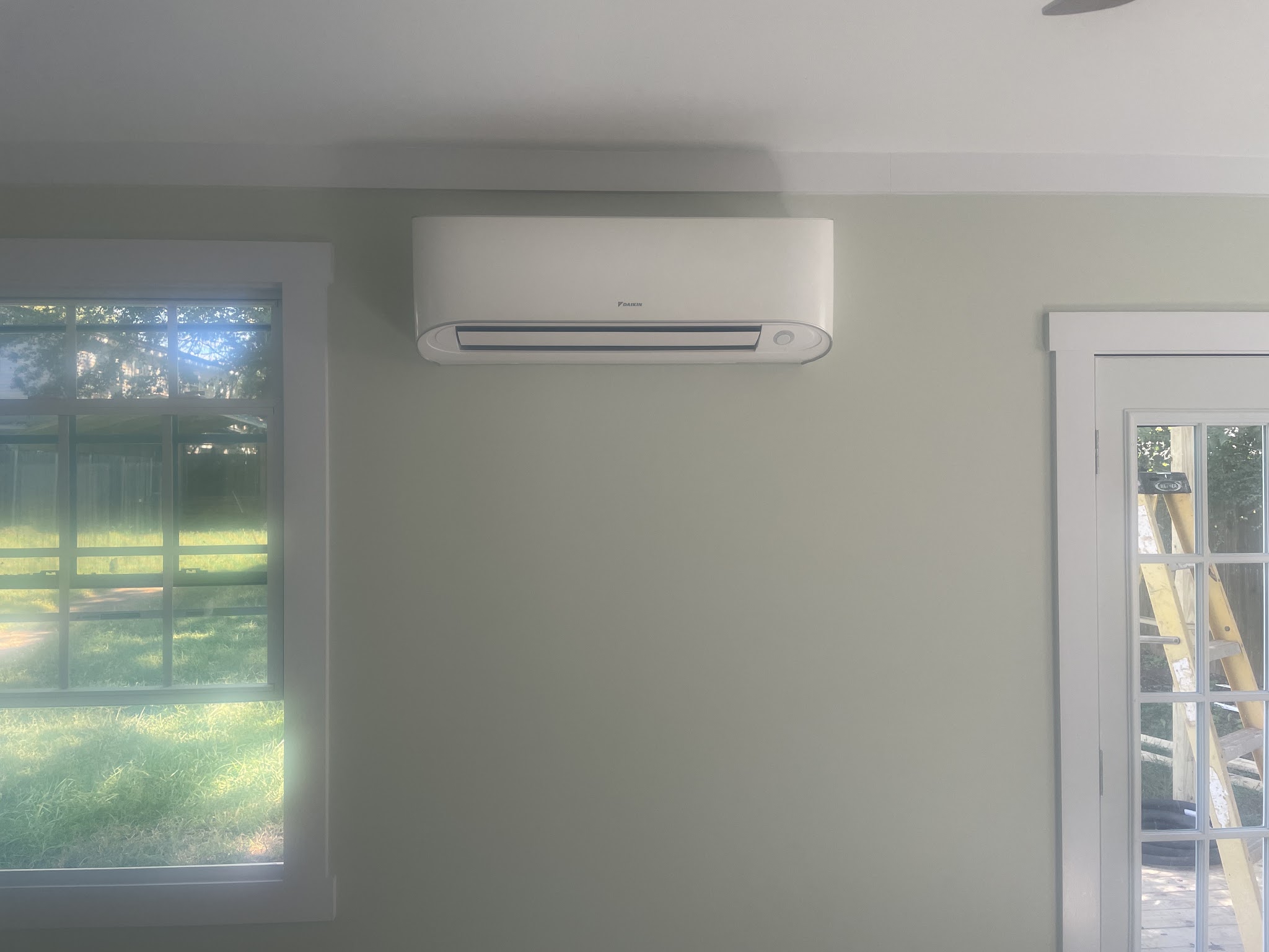 Ductless mini-split indoor unit mounted on a wall